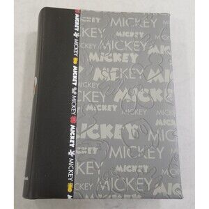 Disney World 4x6 Photo Album featuring Mickey Mouse designs contains some photo